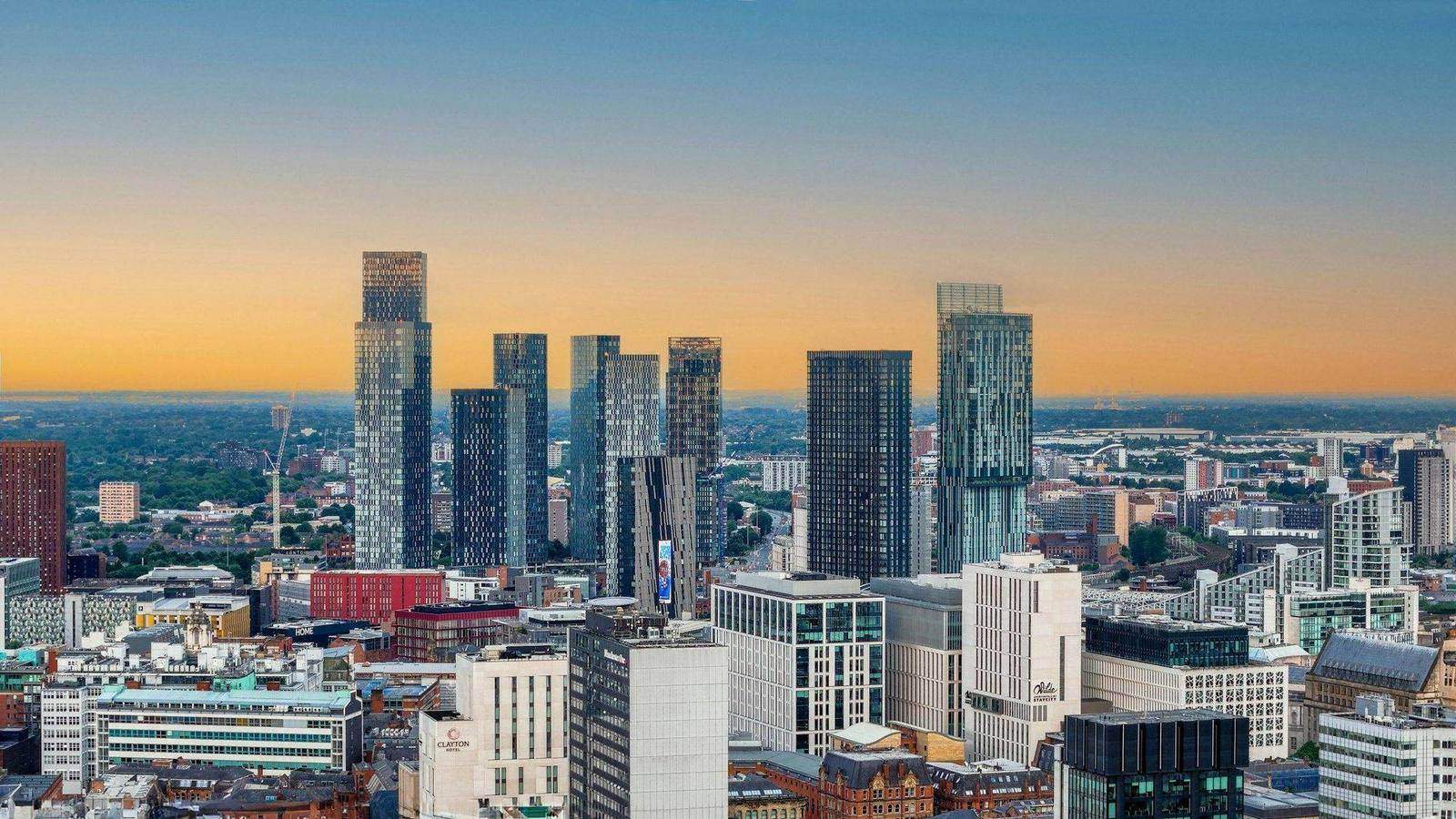 Manchester city skyline at sunrise